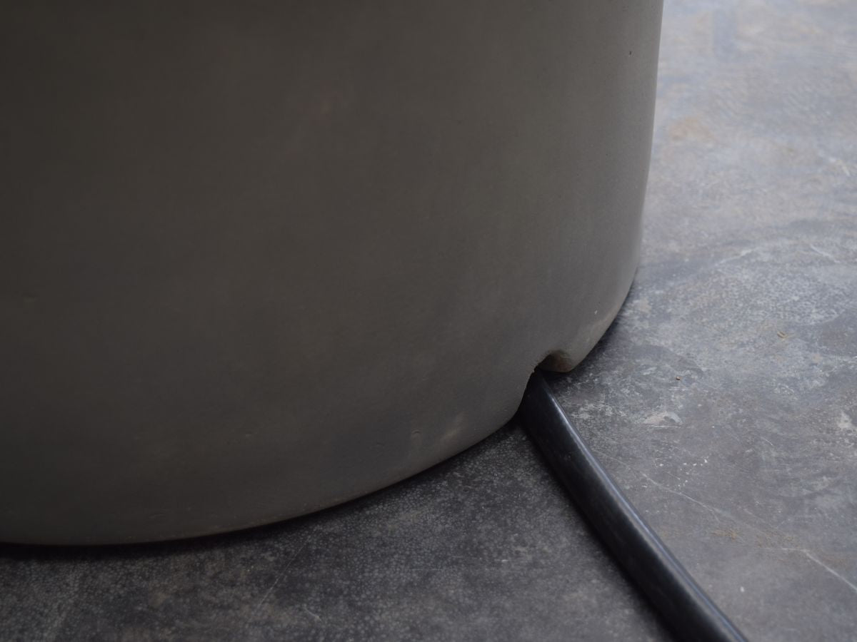 Light Grey Smooth Round Cast Concrete Propane Tank Cover